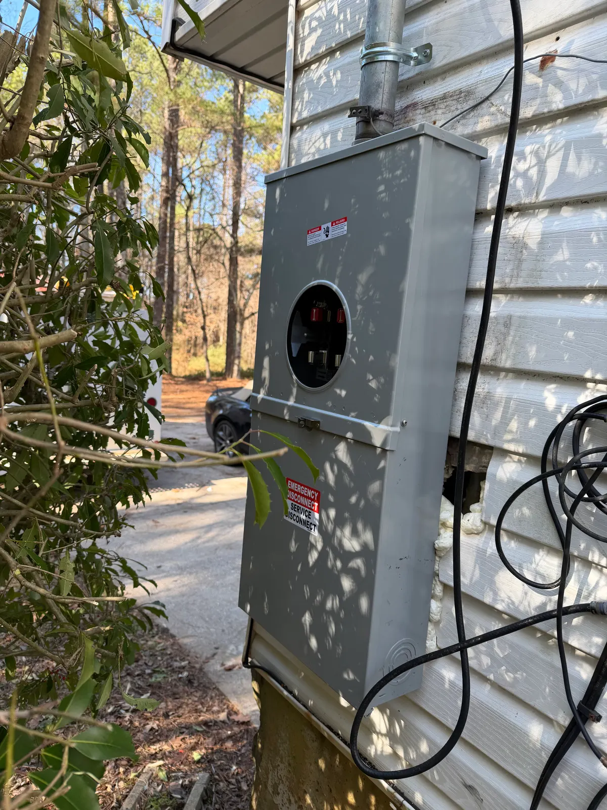 New electric meter and service equipment after a Kennesaw service upgrade for an EV charger
